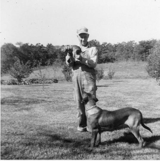 scan0152.jpg - Grandpa Baker with Duke and a rabbit.  Warsaw, MO