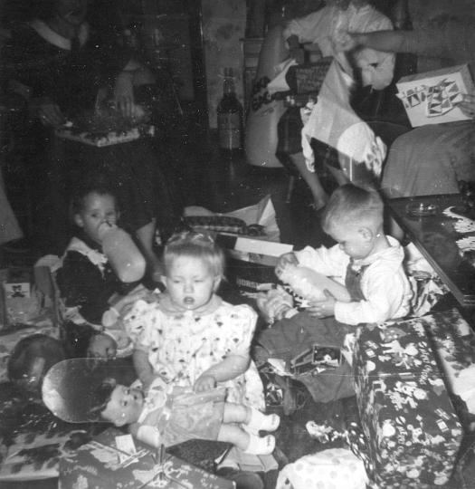 scan0160.jpg - Yvonne, Melody, Robert.  Christmas '56. KCMO