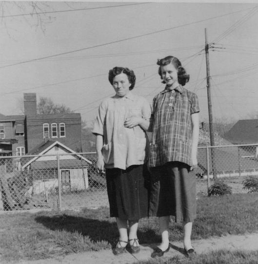 scan0177.jpg - Virginia and Louise both pregnant.  Easter 1954.  Whatsoever Community Center in background.  Where Yvonne took tap dancing lessons.