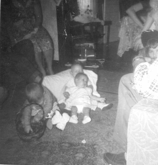 scan0181.jpg - Robert (left), Melody and Yvonne (center), Carol Ann (right).  12th St.  KCMO