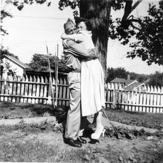 scan0187.jpg - Dean and virginia home coming from Korea.  12th St.  KCMO