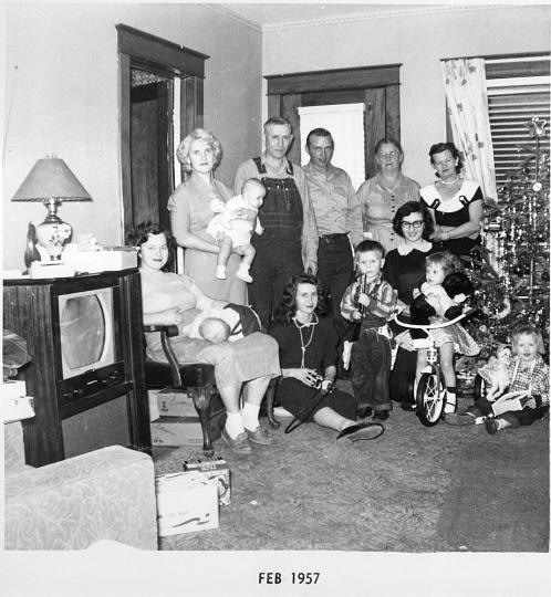 scan0007.jpg - Virginia and Donny, Betty and Kimmy, Lloyd, Dean, Great Grandma, Mildred, Louise, Robert, Katherine, Melody and Yvonne.  12th St.  KCMO
