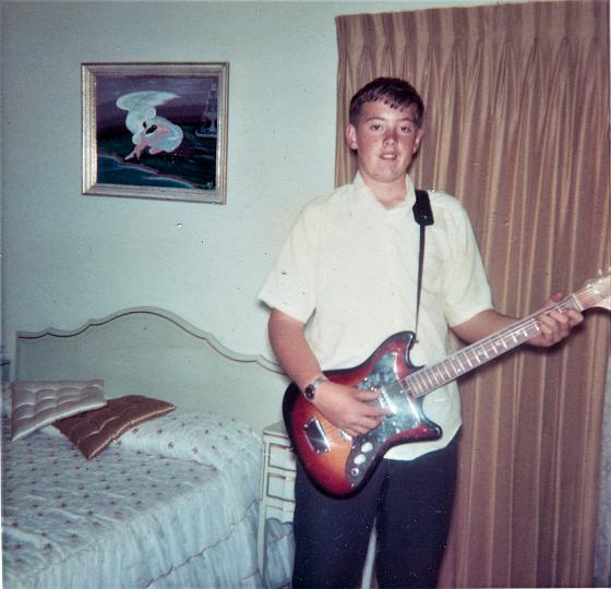 scan0003.jpg - Maurice with first electric guitar.  Decatur, GA 1964